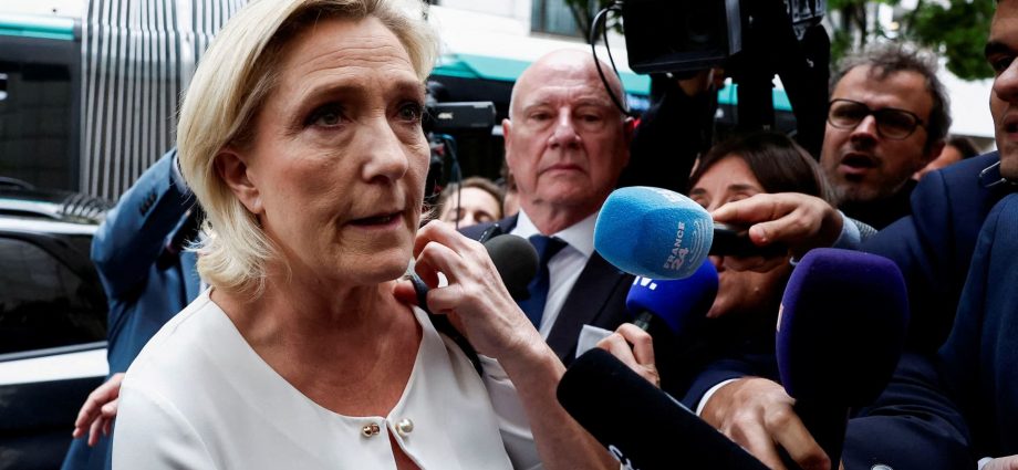 France's Le Pen awaits verdict in embezzlement trial