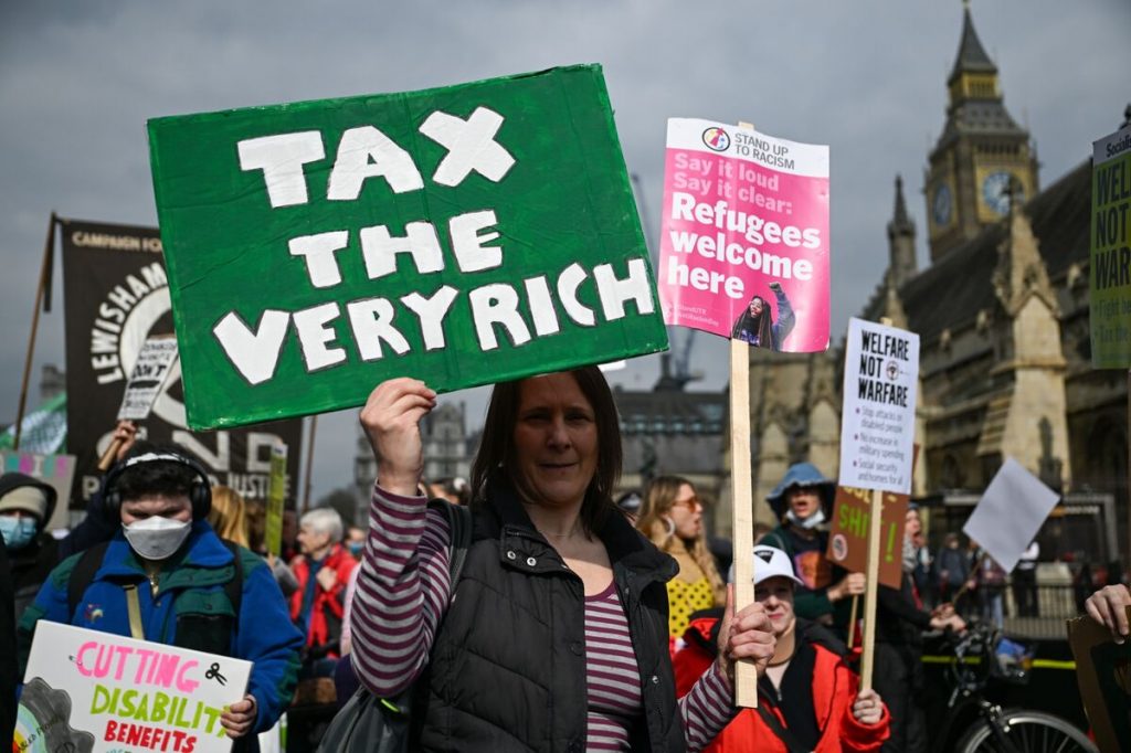 The UK Cuts While Germany Thrusts