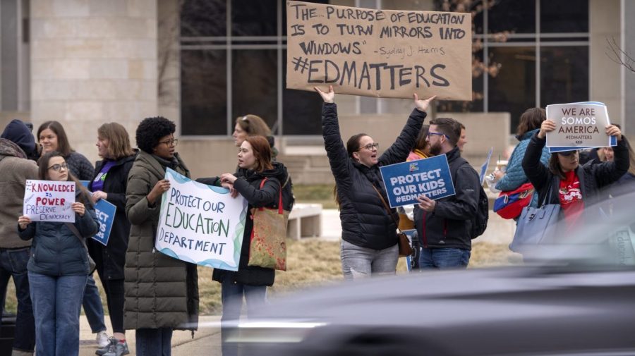 Fired Department of Education employees clean out desks