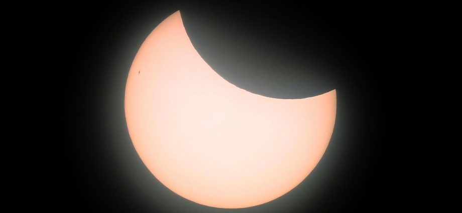 The partial solar eclipse on Saturday. Pic: AP