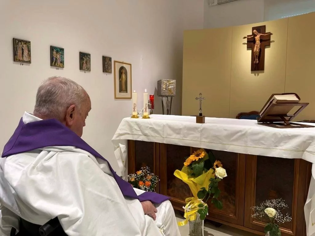 Vatican releases first photograph of the pope in a month as he celebrates Mass in hospital chapel