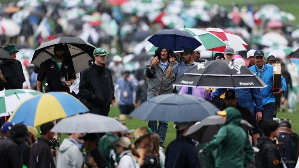 Masters practice round suspended due to rain