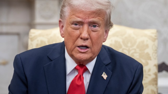 Donald Trump talks to media in Oval Office