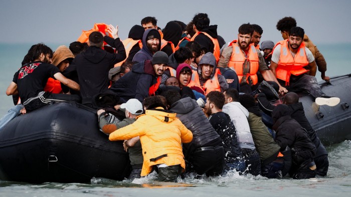 UK and France in talks over a migrant returns agreement