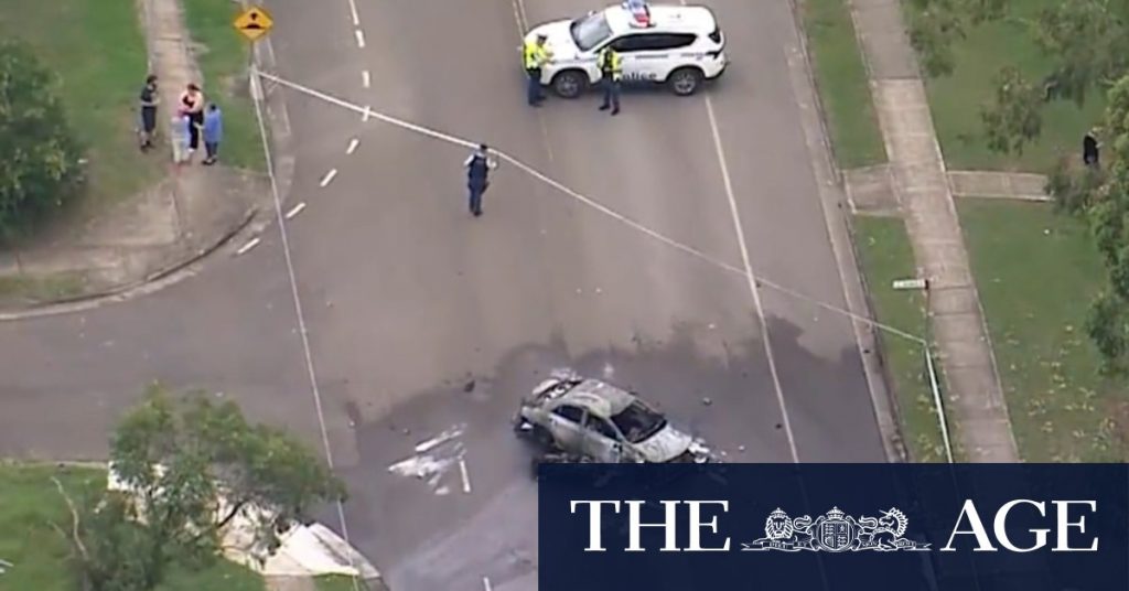Car bursts into flames on Sydney street after motorcycle crash