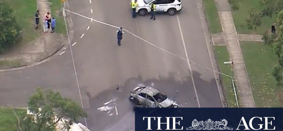 Car bursts into flames on Sydney street after motorcycle crash