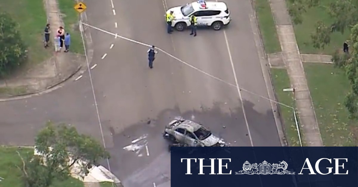 Car bursts into flames on Sydney street after motorcycle crash