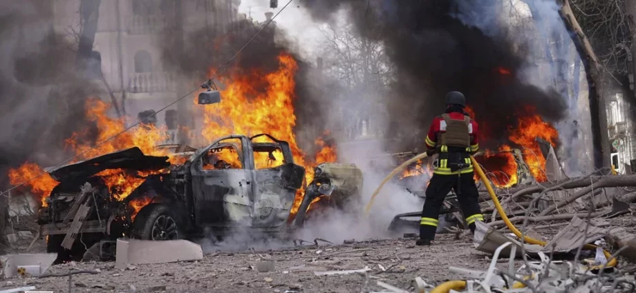 In this photo provided by the Ukrainian Emergency Service, firefighters put out the fire following Russia
