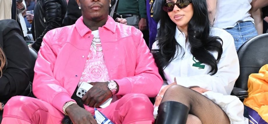 Mariah The Scientists Courtside Basketball with Young Thug Wearing a $740 Coperni Gathered Hem Shirt Dress and Amina Muaddi Boots