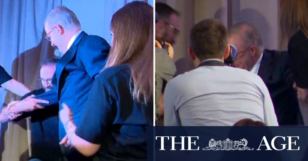 Anthony Albanese takes a tumble on stage