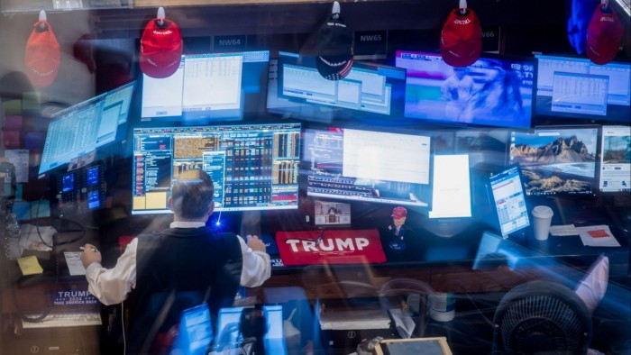 A trader works on the floor of the New York Stock Exchange
