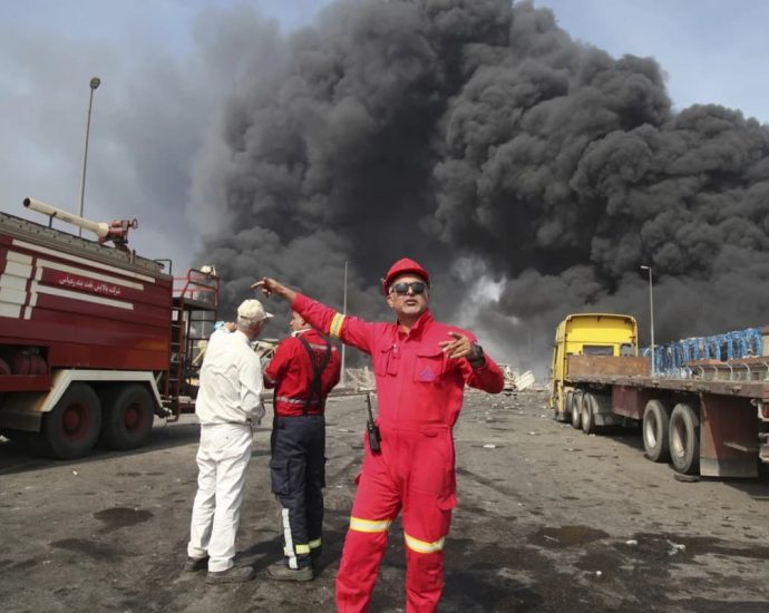 Terrifying explosion linked to missile fuel shipment at key Iranian port kills eight and injures 750