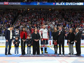 Former NHL player Wayne Gretzky speaks after Alex Ovechkin #8 of the Washington Capitals scores his 895th career goal during the second period against the New York Islanders to become the NHL all-time goals leader at UBS Arena on April 6, 2025 in Elmont, N.Y.
