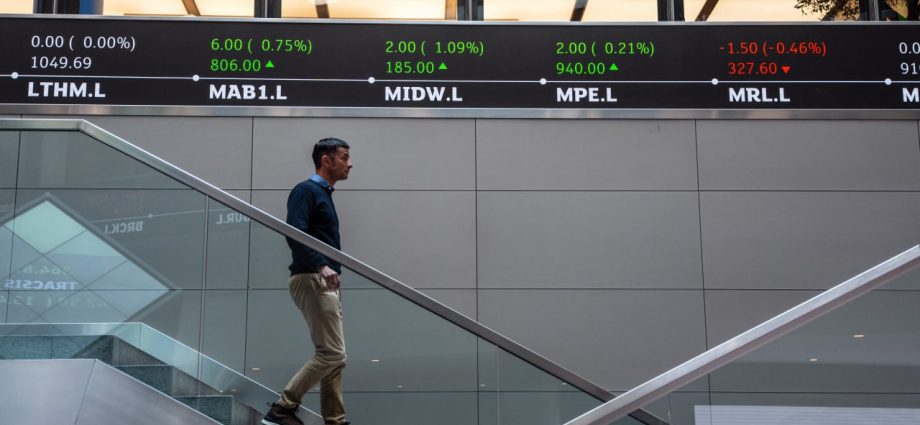 Global Markets Mixed Ahead of Big Tech Reports, Economic Data