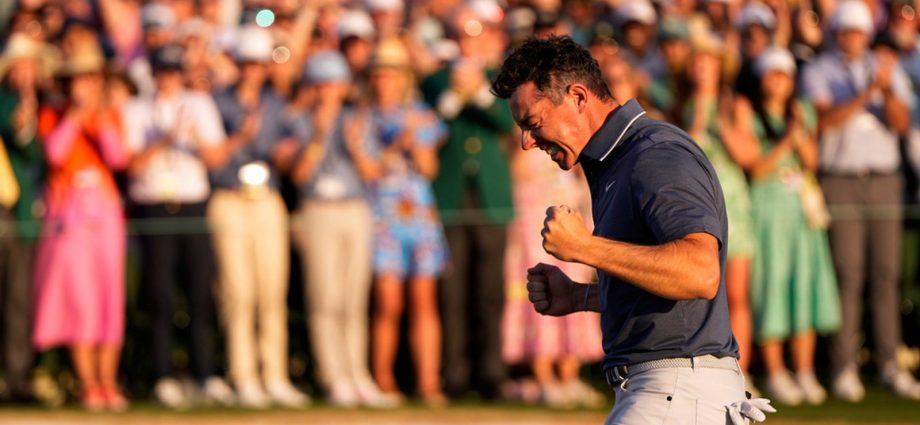 Rory McIlroy, of Northern Ireland, reacts after winning in a playoff against Justin Rose after the final round at the Masters golf tournament, Sunday, April 13, 2025, in Augusta, Ga. (AP Photo/Julia Demaree Nikhinson)