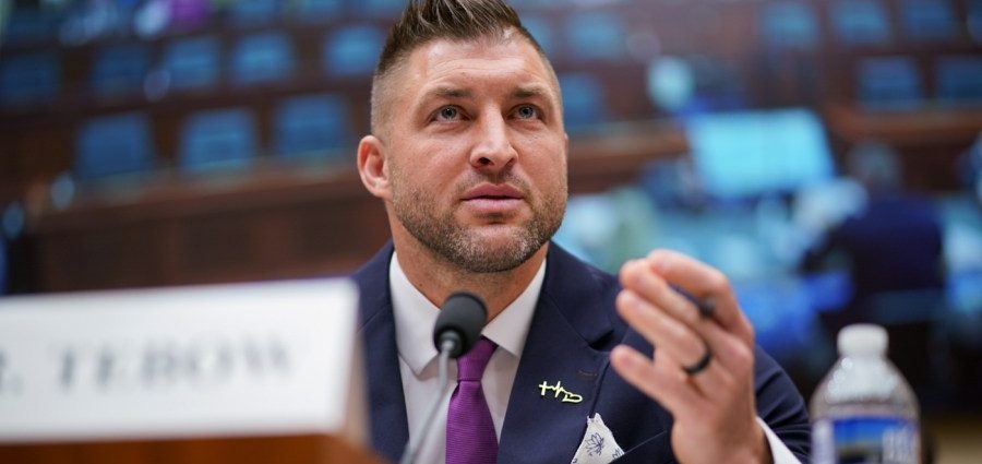 Former NFL star Tim Tebow joins Trump in Oval Office