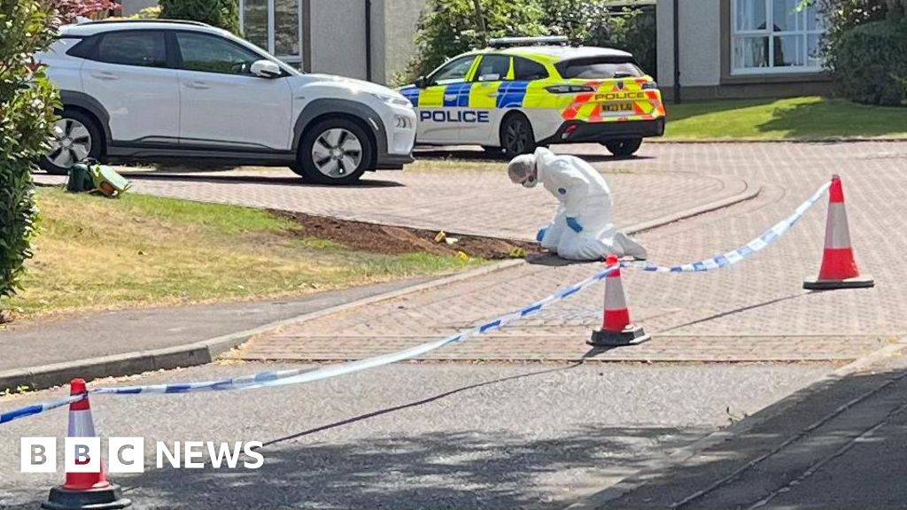 Man slashed by masked gang outside home as feud escalates