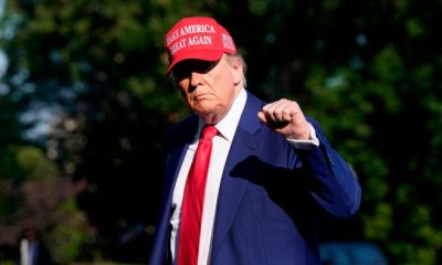 President Donald Trump walks on the South Lawn upon arriving at the White House