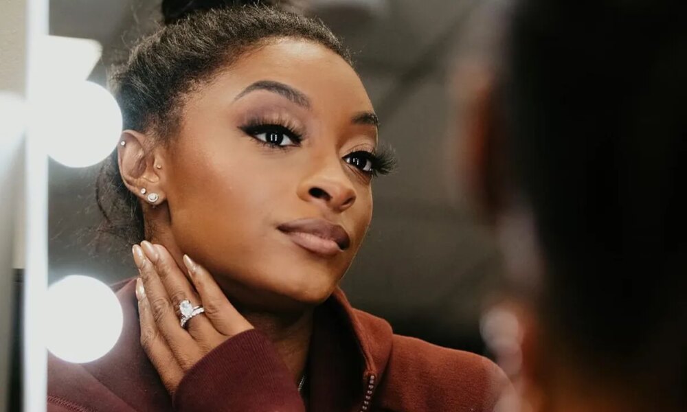 Video caught Simone Biles visibly annoyed as she waited wearily at the airport