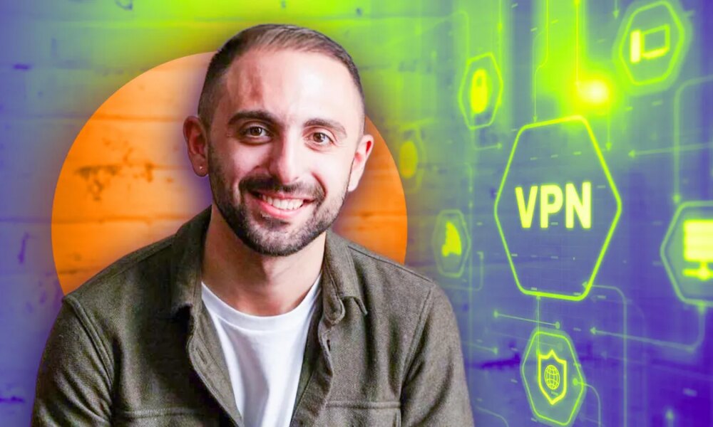 image of Mike De Socio smiling with a VPN green glowing symbol in the background