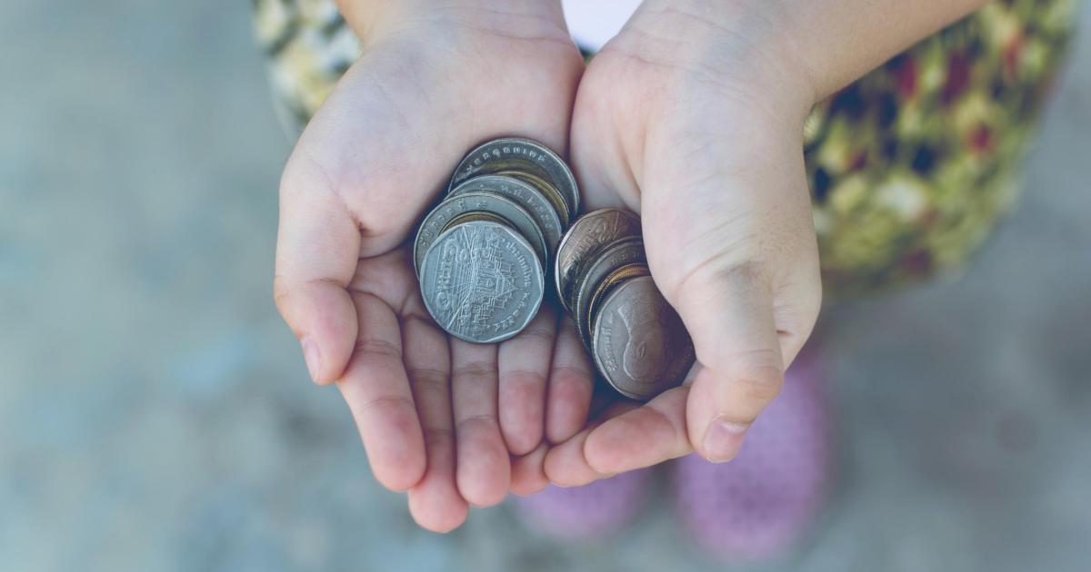 What is the DWP two-child benefit cap and who introduced it?