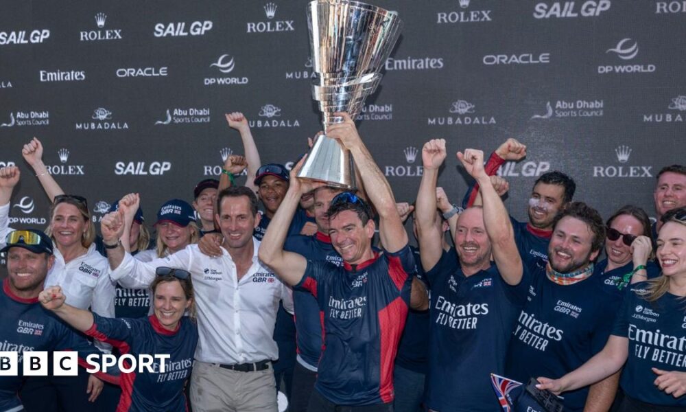 The British team celebrate with the SailGP trophy