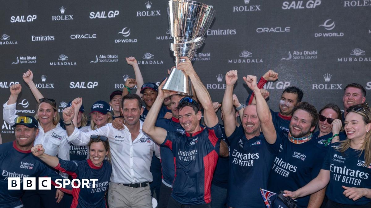 The British team celebrate with the SailGP trophy