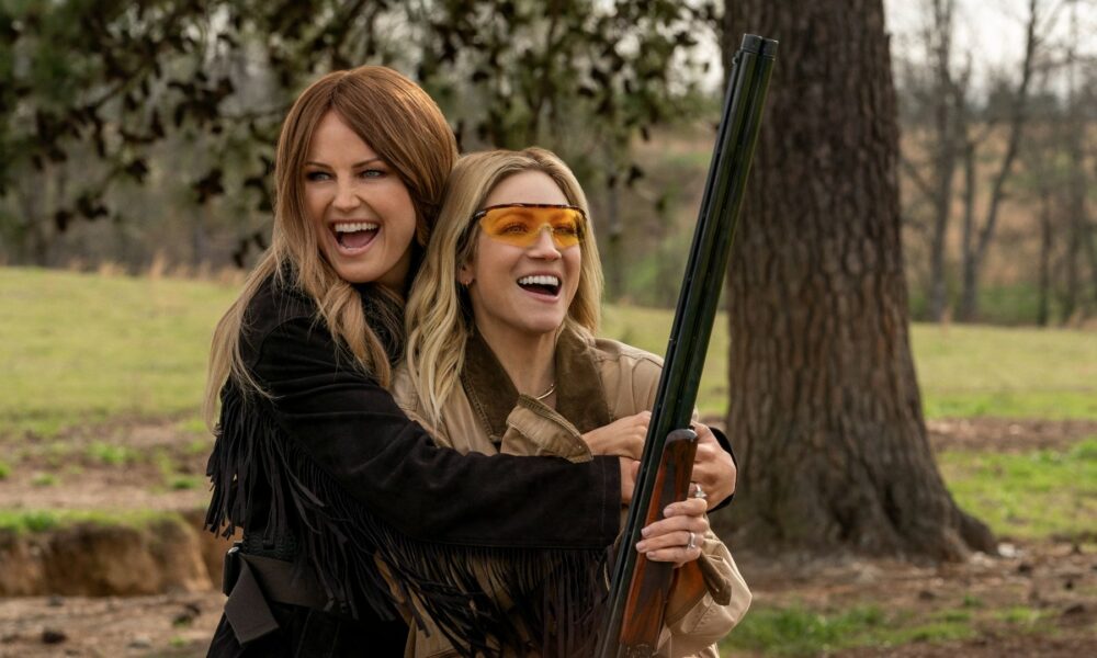 Margo and Sophie hug and smile in The Hunting Wives