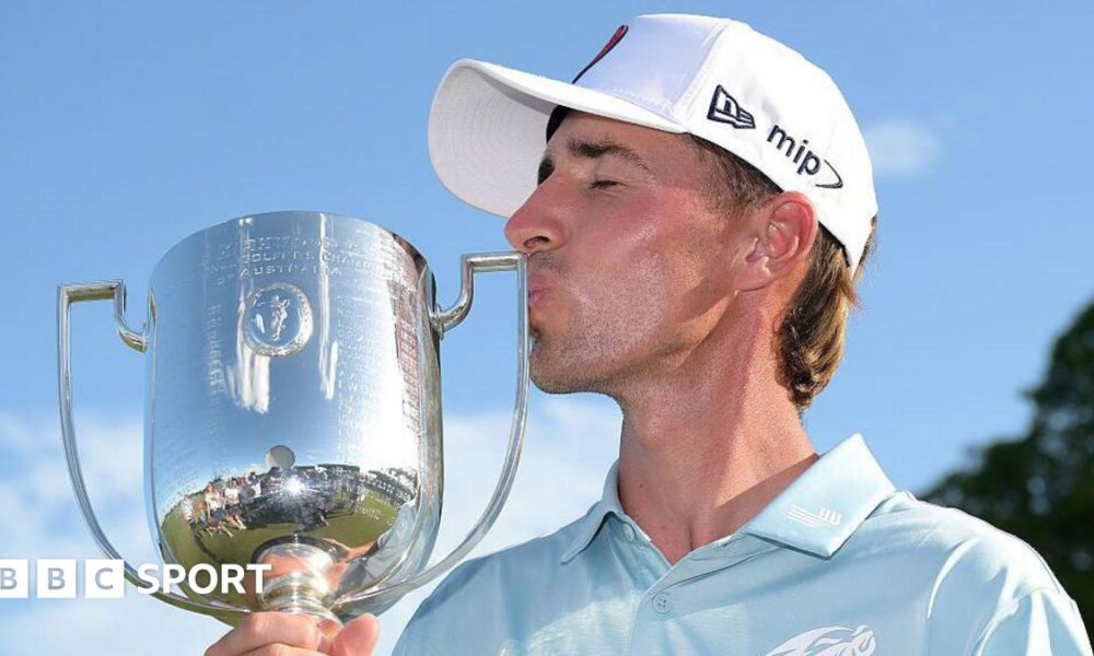 David Puig kissing the Australian PGA Championship trophy