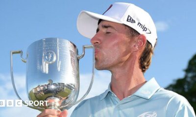David Puig kissing the Australian PGA Championship trophy