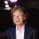 Sir Mick Jagger makes surprise visit to his old school