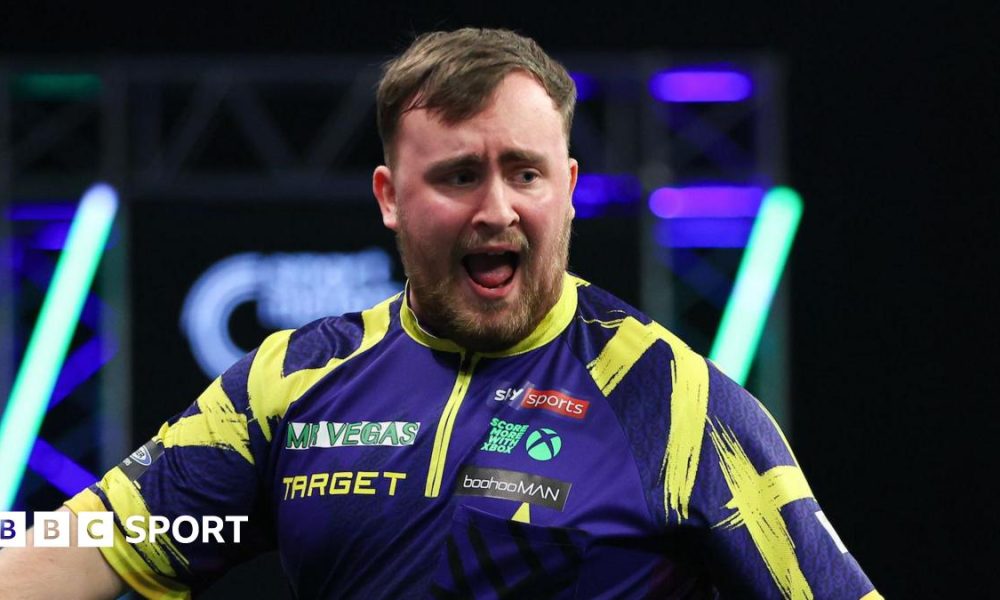 Luke Littler wins Grand Slam of Darts and secures world number one spot