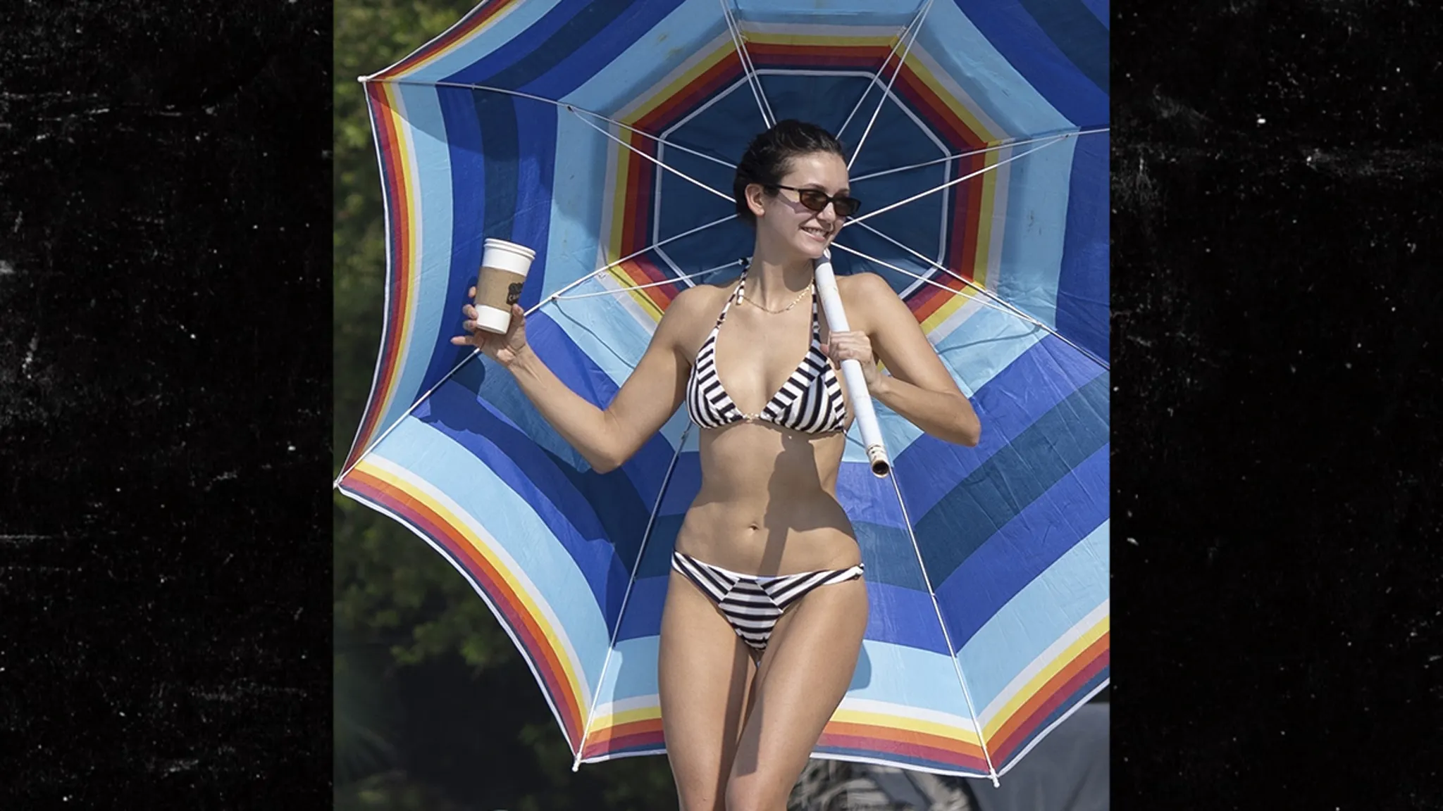 Nina Dobrev Strips Down to Zebra-Print Bikini For Thanksgiving Beach Day