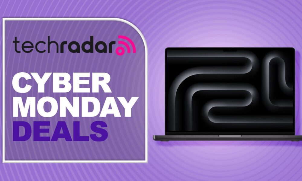 A MacBook Pro against a purple TechRadar Cyber Monday deals background