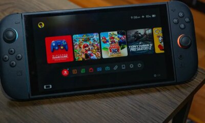 Image may contain: Electronics, Mobile Phone, Phone, Camera, Computer, Person, and Screen