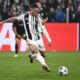 TURIN, ITALY - NOVEMBER 04: Dusan Vlahovic of Juventus takes a shot during the UEFA Champions League 2025/26 League Phase MD4 match between Juventus and Sporting Clube de Portugal at Juventus Stadium on November 04, 2025 in Turin, Italy. (Photo by Stefano Guidi/Getty Images)