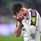TURIN, ITALY - NOVEMBER 29: Dusan Vlahovic of Juventus FC lies injured during the Serie A match between Juventus FC and Cagliari Calcio at Allianz Stadium on November 29, 2025 in Turin, Italy. (Photo by Valerio Pennicino/Getty Images)