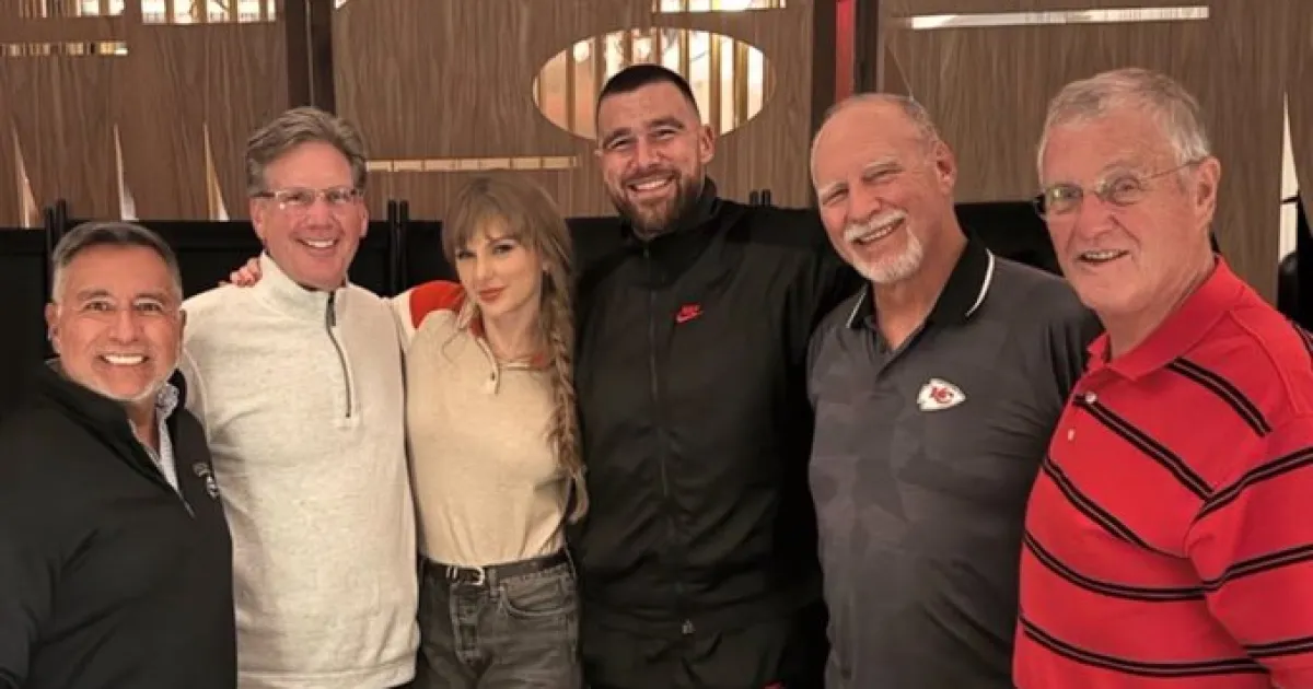 Taylor Swift Cuddles Up With Fiance Travis Kelce And Dad Scott