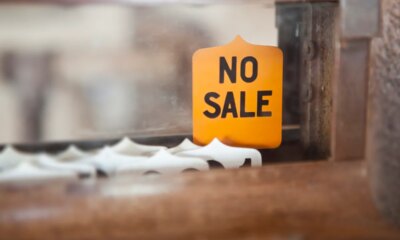 A 'NO SALE' sign on an Antique Cash Register