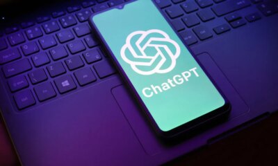 The ChatGPT logo appears on a smartphone screen