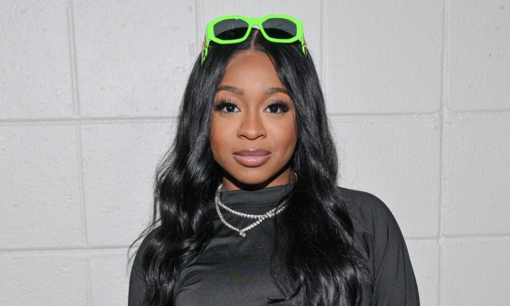 Internet Users Are Droppin' Mixed Reactions After Reginae Carter Flossed Her New Smile After Getting Her Teeth Done (VIDEOS)