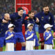 MILAN, ITALY - NOVEMBER 16: Players of Italy sing the national anthem prior to the FIFA World Cup 2026 qualifier match between Italy and Norway at San Siro Stadium on November 16, 2025 in Milan, Italy. (Photo by Marco Luzzani/Getty Images)