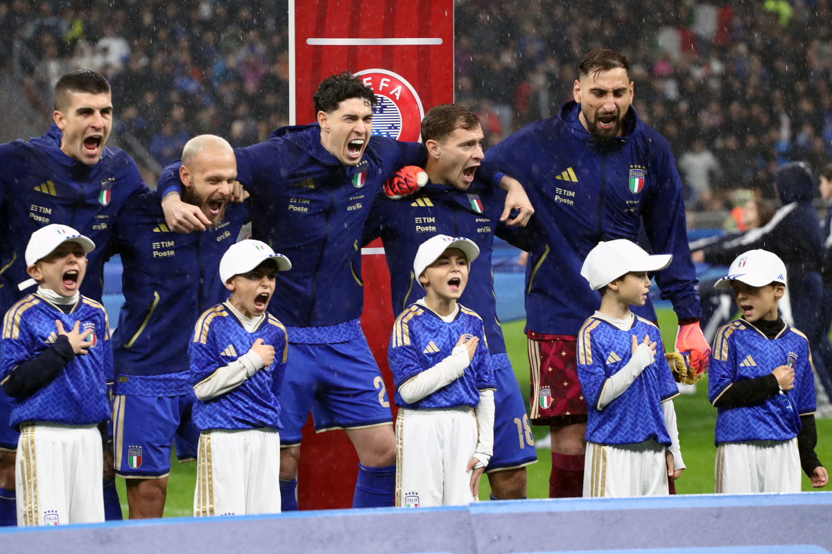 MILAN, ITALY - NOVEMBER 16: Players of Italy sing the national anthem prior to the FIFA World Cup 2026 qualifier match between Italy and Norway at San Siro Stadium on November 16, 2025 in Milan, Italy. (Photo by Marco Luzzani/Getty Images)