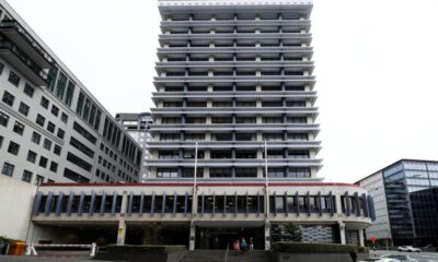 NZ central bank cuts cash rate by 25 bps to 2.25%