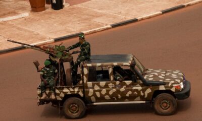 General sworn in as Guinea-Bissau leader in swift coup after disputed vote