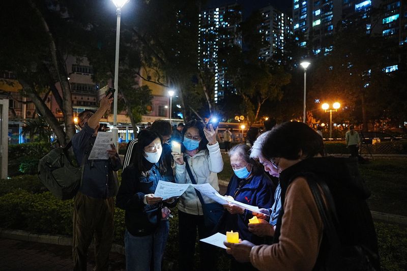 Hong Kong mourns victims of apartment blaze that killed 128 and counting
