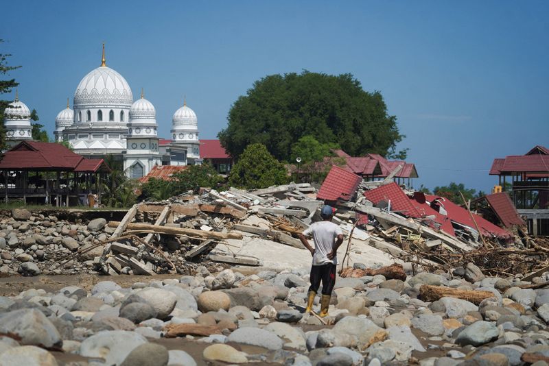 Indonesia flood death toll climbs to 303 amid cyclone devastation, disaster agency says