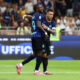 MILAN, ITALY - AUGUST 25: Lautaro Martinez of Internazionale celebrates with teammate Marcus Thuram after scoring his team