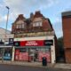 'Commercial investment' arises as property with unit and four flats gets ready to go under the hammer
