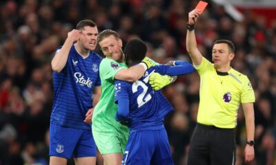 Idrissa Gueye is held back by Jordan Pickford and is sent off after slapping team-mate Michael Keane